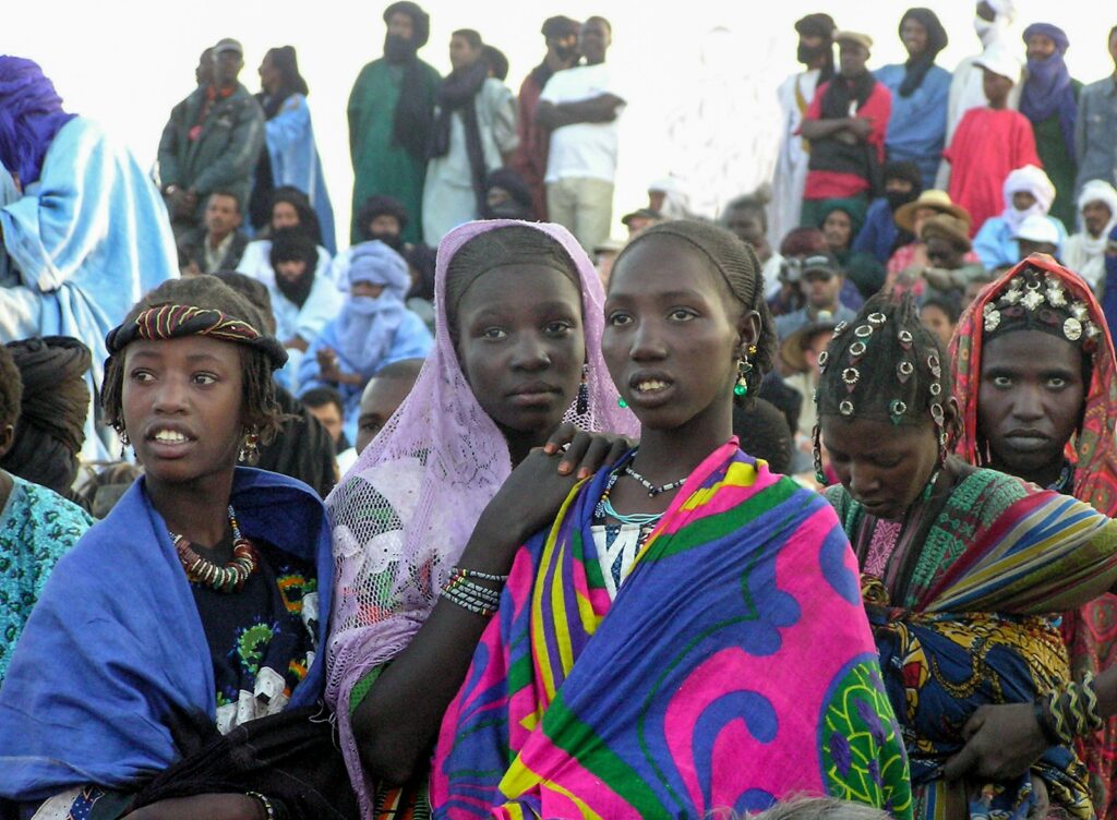 A group of people standing next to each other